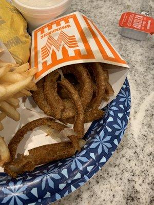 Onion rings that looked and tasted like old oil.