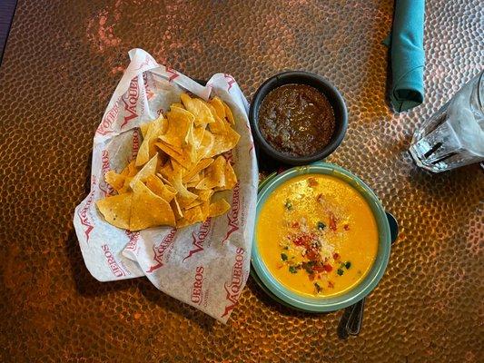 Chips, Salsa and a large Queso