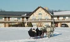 Sleigh Ride in front of Inn in the winter. We need a 4" base to start these rides.