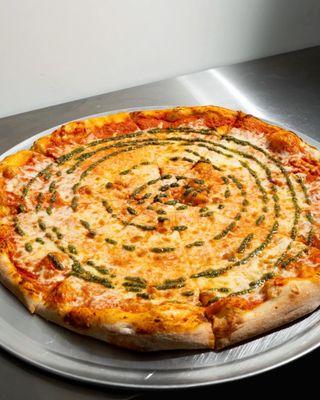 Come try our Vodka Pesto pizza! Made with vodka sauce, fresh mozzarella cheese and pesto.