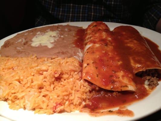 Enchilladas I believe...and the beans are delicious!