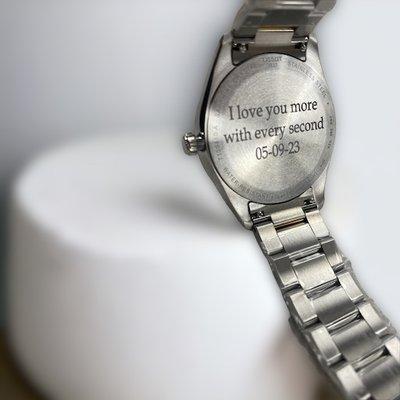 Etched watch with a personal message.