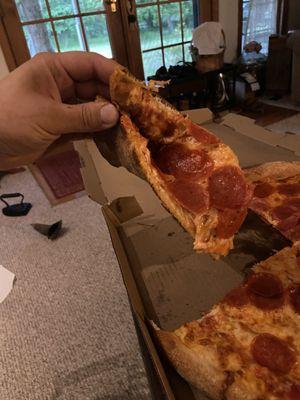 Greasy and floppy pizza