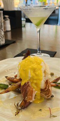 Champagne poached South African lobster tails over root vegetables (instead of risotto) with infused truffle butter and saffron sauce.