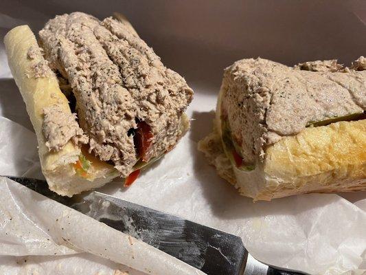 Tuna Hoagie cut in half.