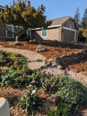 Post-installation: gravel path and retaining wall