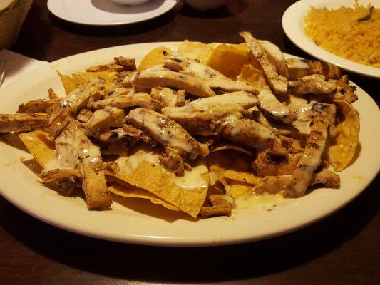 First time having the fajita chicken nachos. Massive plate of meat.