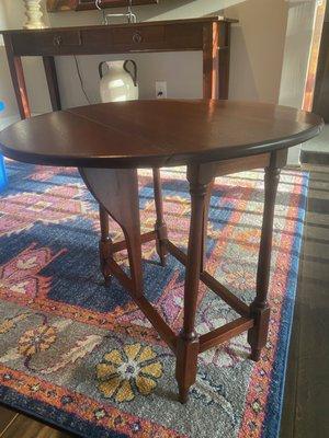 My husband's grandfather's refinished drop leaf side tables. Refurbished by Bill Flowers of River Bend Studios.