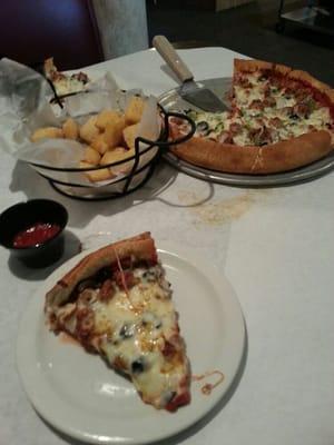 Fried delicious beer nuggets with marinara and thick crust Alfonso pizza