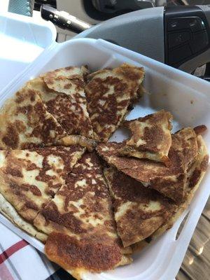 Large quesadilla with taco meat