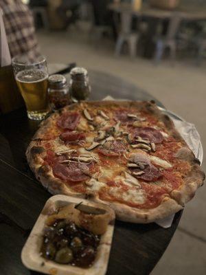 Mushroom & Salami pizza and house marinated olives