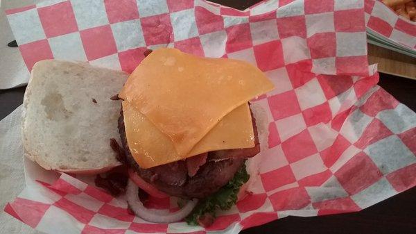 $12 half pound burger in a basket