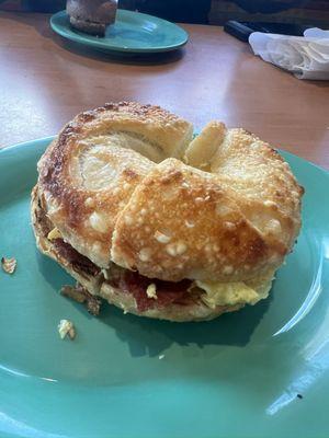 Bacon egg and cheese on an Asiago bagel