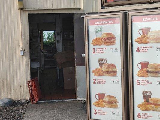 Back Door open in view of the Drive-Thru. They want you to see that 3/4 of the crew is smoking and you are dealing with one employee.