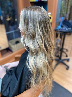 Blonde hair with highlights beautifully placed in