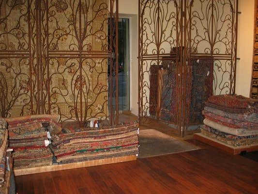 Antique rugs in our showroom.