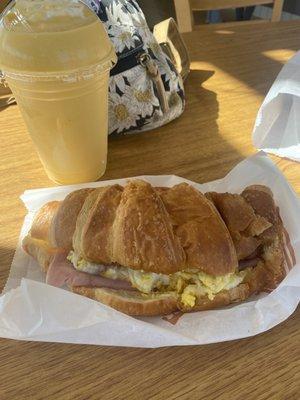 $4.25 ham, egg, sausage, cheese croissant. Mango smoothie