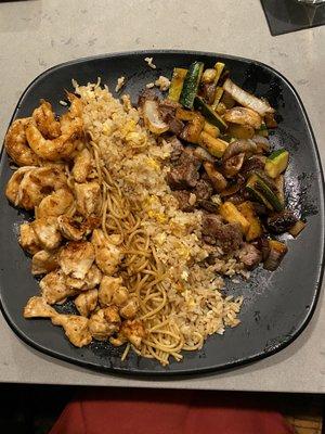 Filet, chicken and shrimp - it comes with veggies (zucchini, onions and mushrooms), noodles and rice (I upgraded to fried rice)