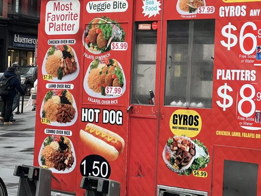 7:00am March 9th, the food cart is on location,  the cart is wet from the rain, and under the cart is dry, has a padlock.