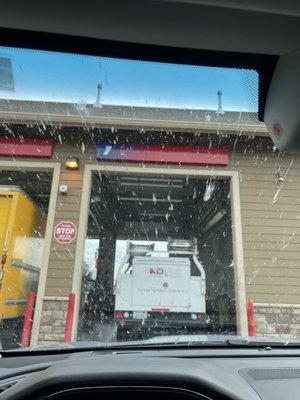 My Bug laden windshield before Squeaky's car wash.