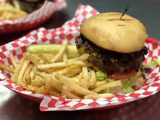 San Jose is a delicious burger topped with smoked brisket, cheddar cheese and BBQ sauce! Best enjoyed with an ice cold Tecate