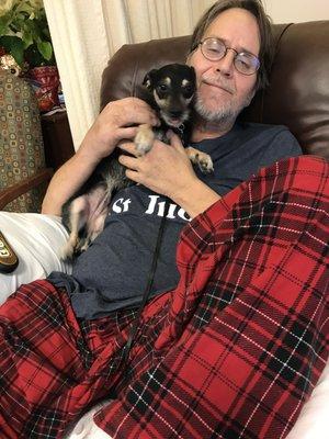 Jimmy with his dog Daisy in his room at Morningside Manor