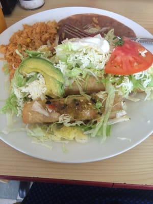 Flautas de pollo with rice and beans. Delish