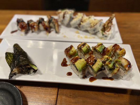 Salmon skin hand roll and a whole bunch of rolls.