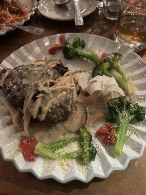 Fillet with wild mushrooms and a Gorgonzola topping served with vegetables.