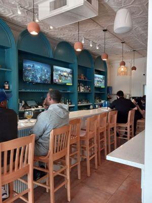 Bar at the restaurant entrance separate from the dining areas