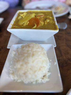 Yellow curry with chicken. A little spicy and we loved it.