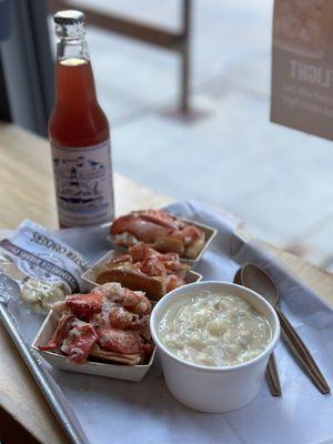 Lobster Roll Flight (three 2 oz half-rolls: lemon butter, spicy honey butter, and truffle butter w/ chips and a soft drink)