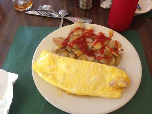 Ham and Cheese omelette with sour dough toast. Yummmmm