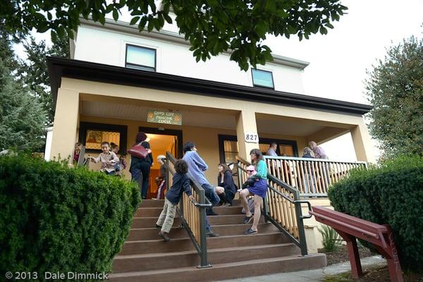 Our community making use of the front porch at the Grand Opening of Good Life Medicine Center.