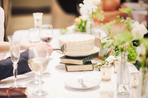 Cake at the bride's and groom's table | Photo by Meagan McLendon