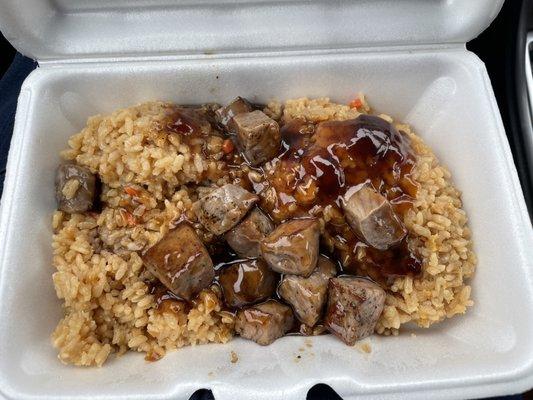 Beef fried rice. They just put beef over rice and poured teriyaki sauce on it.  No eggs, onions, scallions, or stir frying.