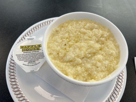 Bowl of breakfast grits (the extra whipped spread was de trop since it was deliciously buttery without it)