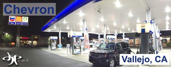 Spacious, well lit, lots of pumps, and just off the freeway. (Thumbs up!)