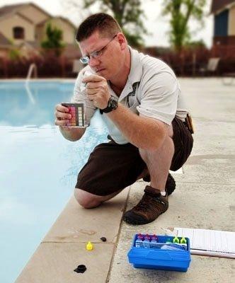 Testing Swimming Pool Levels to keep your family safe.