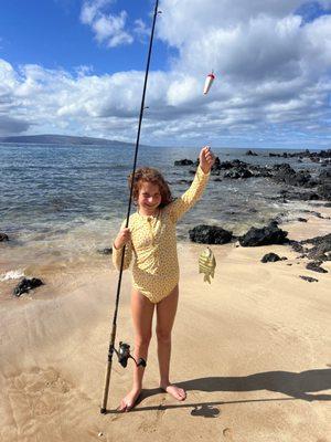 Happy client with her first fish.