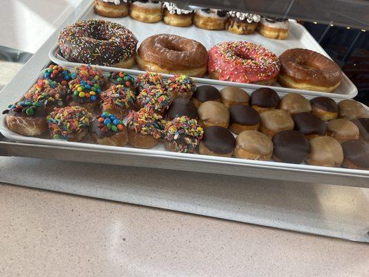 Giant donuts and mini donuts without filling