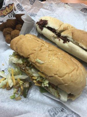 My complete order included the Chicken & Cheddar sub, the Reuben sub, and an order of the Breaded Mushrooms.