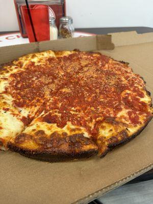 Deep dish Chicago style (sauce goes on top).