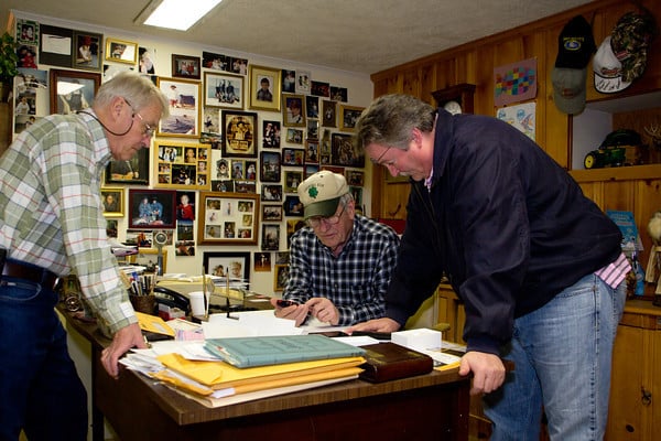 Berk Davis, John Davis and Kevin Smith go over plans for a Heating project in  located in Bethesda, MD