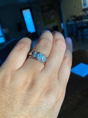 My wedding ring that was repaired, flashed and had bands added to it. It's perfect and I love it! Thank you Goldmart!