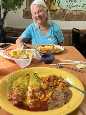 my chilies Renos plate in the foreground and Pat's border burrito in front of her. Homemade chips and salsa to die for in the middle.