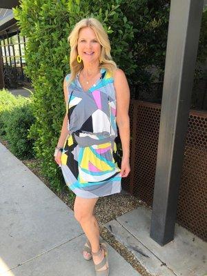 Owner Casee modeling this cute dress!