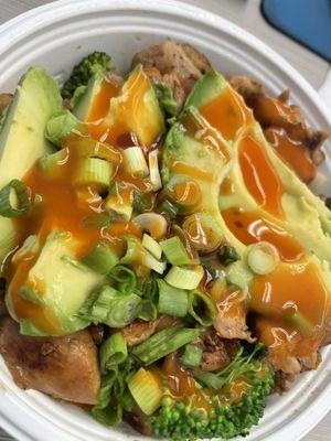 Regular chicken bowl with veggies only and avocado! Added hot sauce on top.