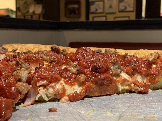 Large deep dish cowboy (meat) pizza