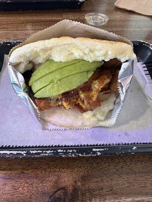 Arepa rellena with avocado, pork belly and sweet plantains